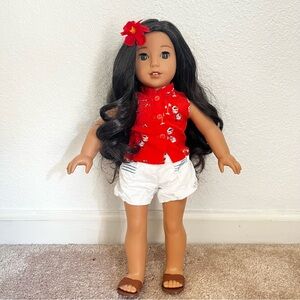 American girl doll Nanea. With book. Excellent condition. Like new